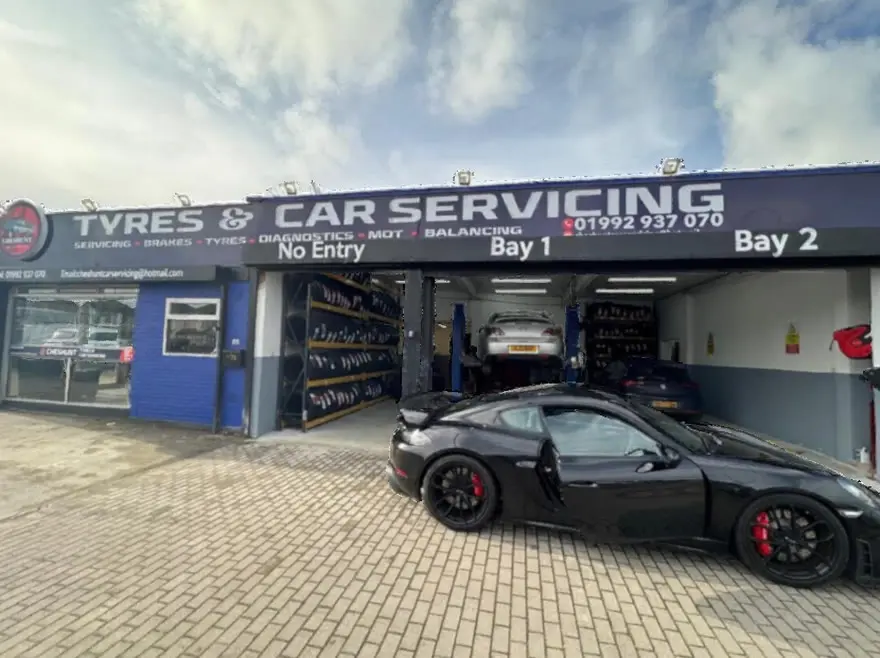 Cheshunt Tyres & Car Servicing garage frontage with two open bays